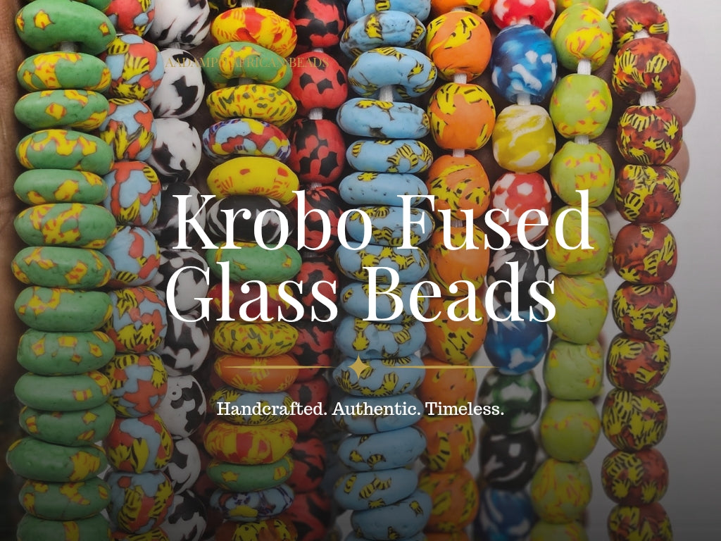 Collection banner for Aadampo African Beads featuring handcrafted Fused Krobo Glass Beads from Ghana. Multiple vibrant strands of fused recycled glass beads in black and white, turquoise, red, yellow, blue, green, and earthy marbled patterns.