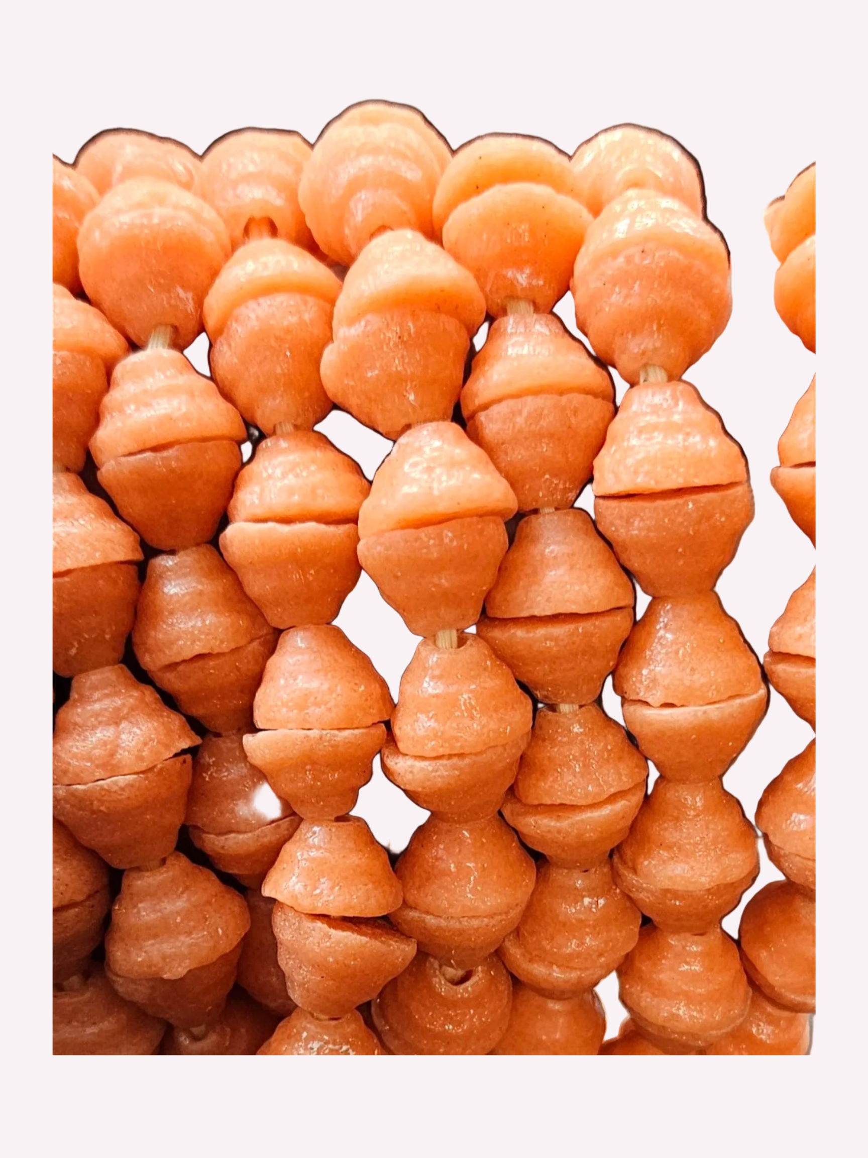 Ghanaian artisan-crafted fancy Krobo beads, showcasing traditional African beadmaking with a distinctive and modern edge.