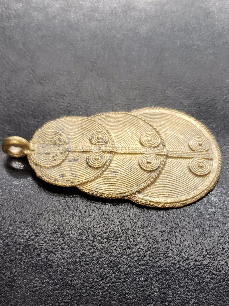 Handcrafted Adornments: Brass Pendants from Ghana