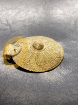 Crafted Brilliance: African Brass Pendant