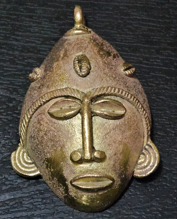 Crafted with Care: Authentic African Brass Mask Pendant