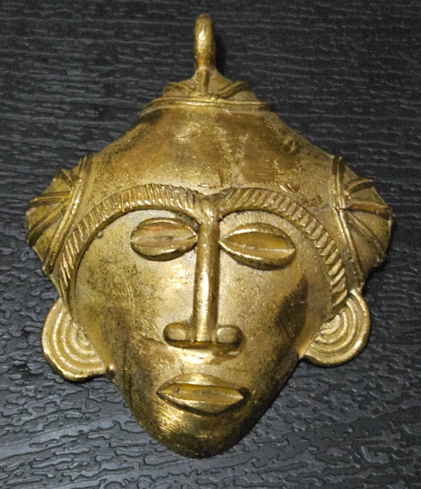 Unique Artistry: African Brass Tribal Mask Pendant - Limited Stock.