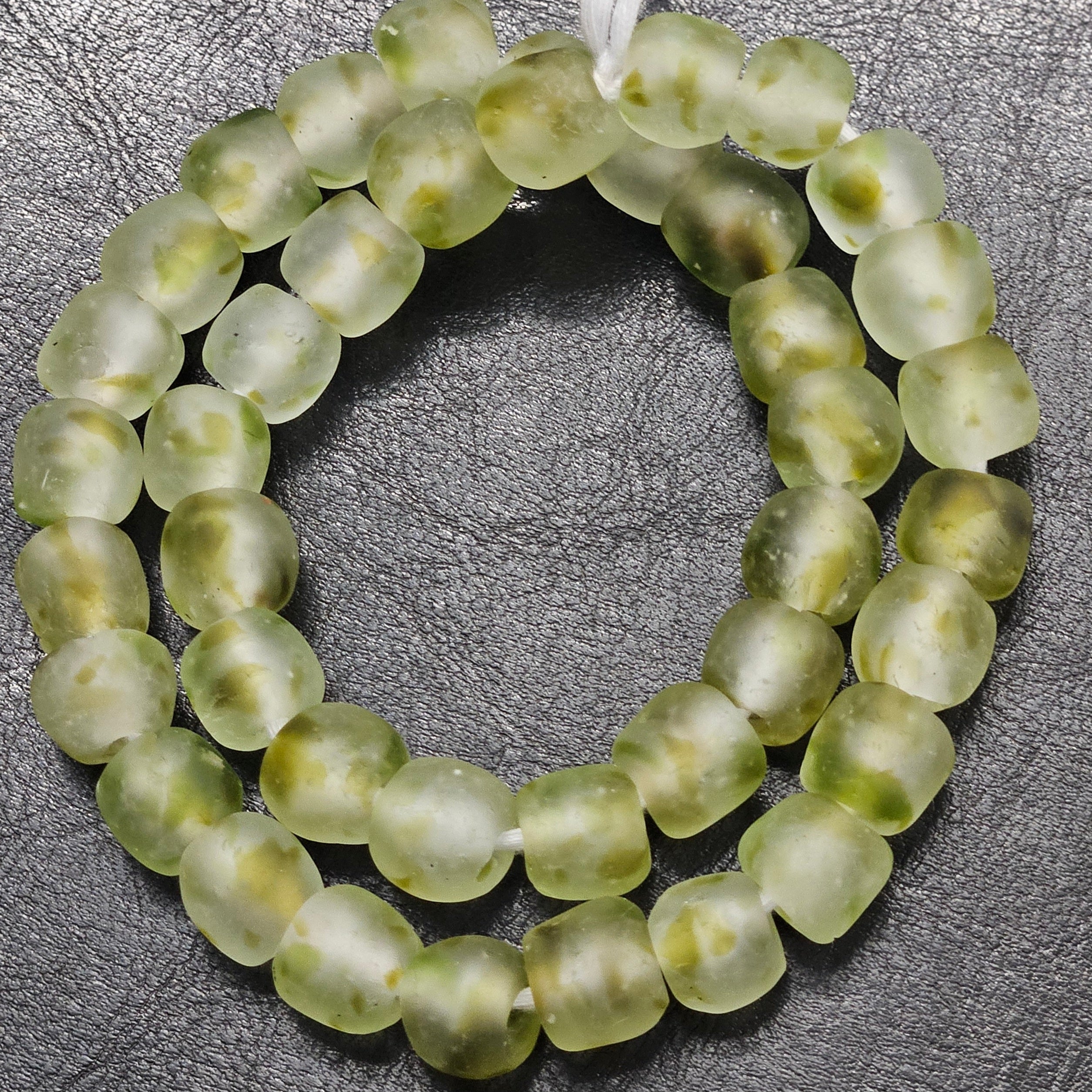 Looking for something both authentic and sustainable? These recycled glass beads from Ghana are running low – act fast to secure your strand today!