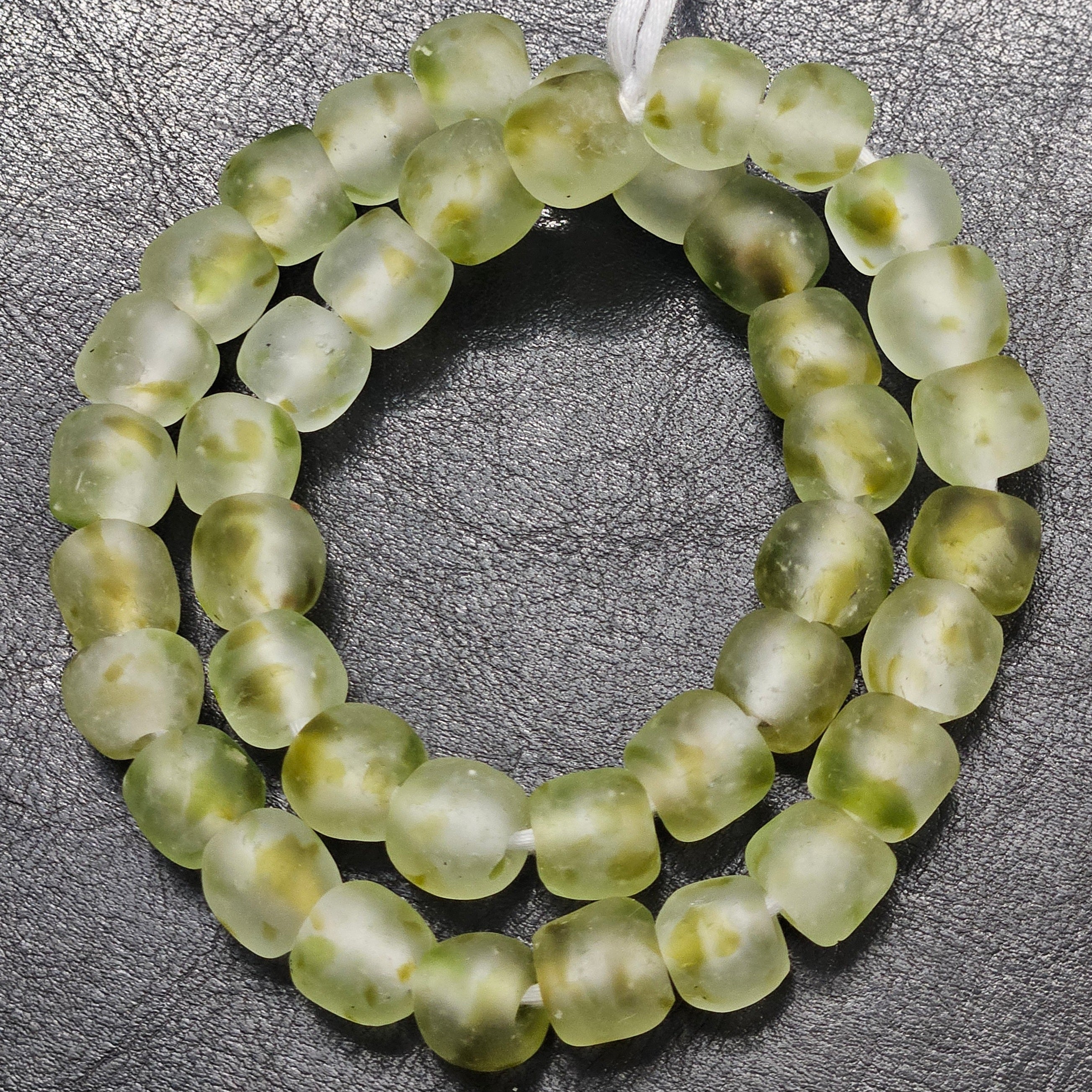 Looking for something both authentic and sustainable? These recycled glass beads from Ghana are running low – act fast to secure your strand today!