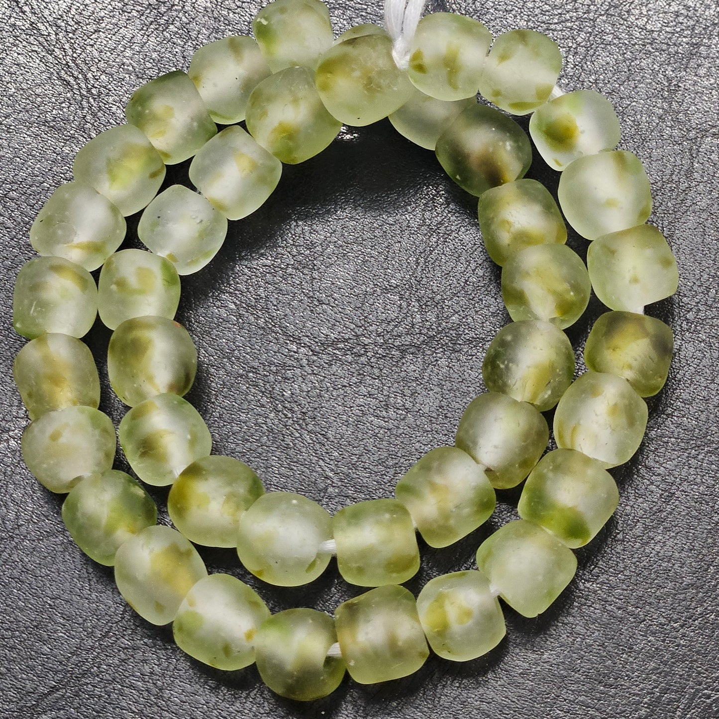 Looking for something both authentic and sustainable? These recycled glass beads from Ghana are running low – act fast to secure your strand today!