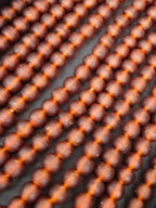 Handmade Krobo Pocket Glass Beads from Ghana – Amber Brown 13–14mm Strand