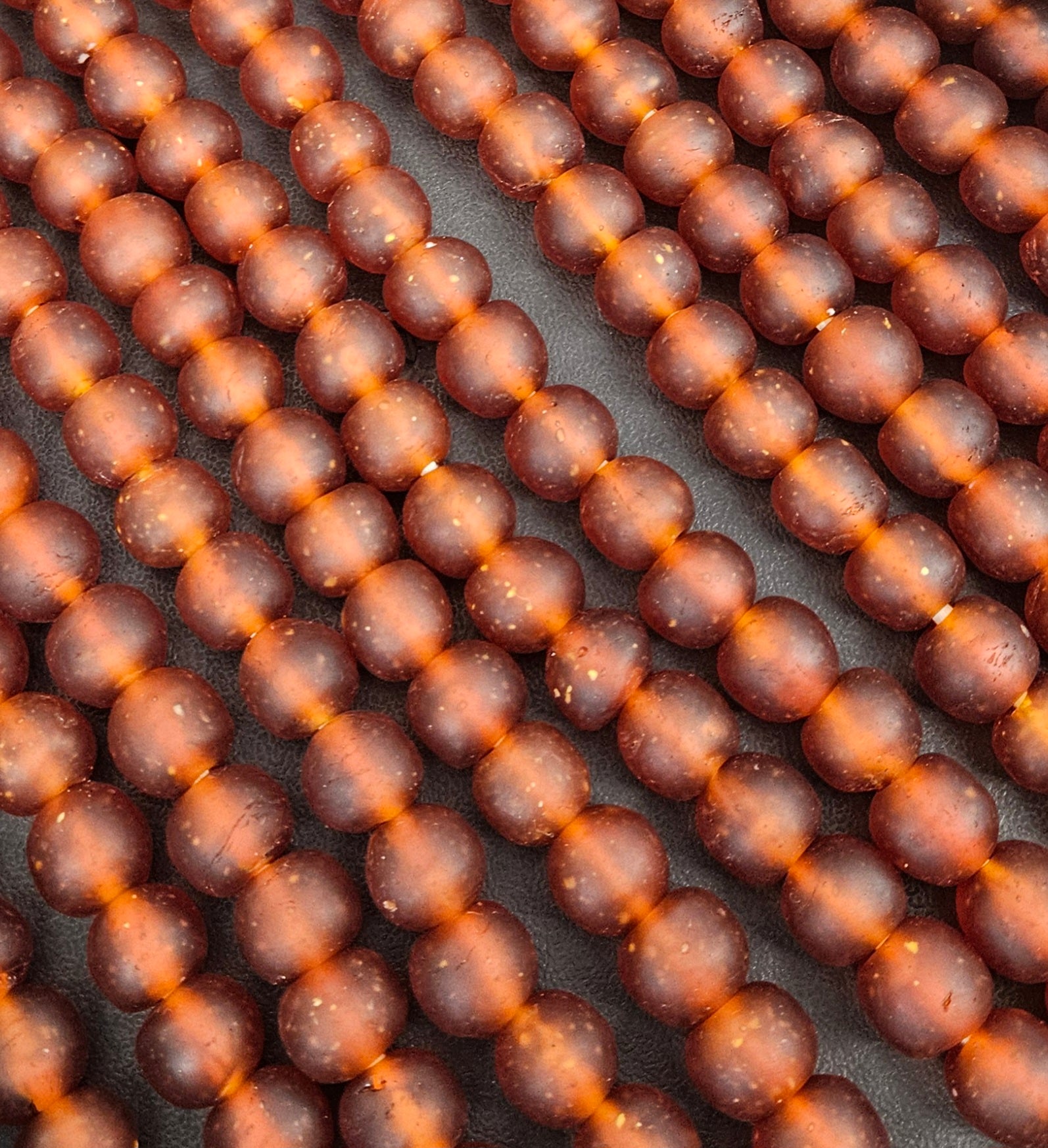 Handmade Krobo Pocket Glass Beads from Ghana – Amber Brown 13–14mm Strand