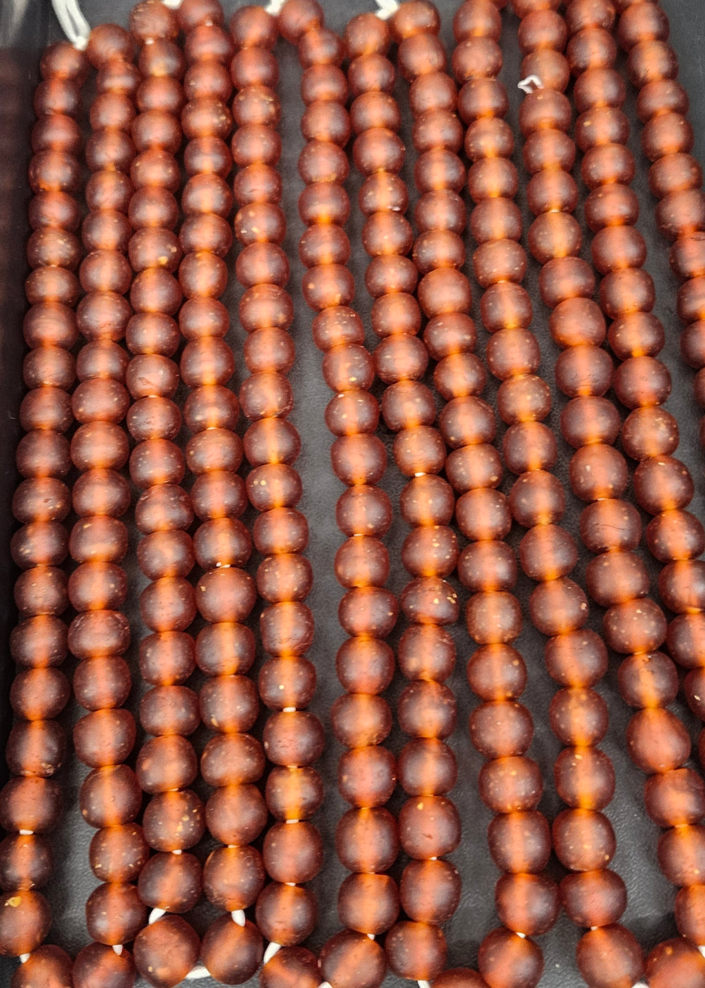 Handmade Krobo Pocket Glass Beads from Ghana – Amber Brown 13–14mm Strand