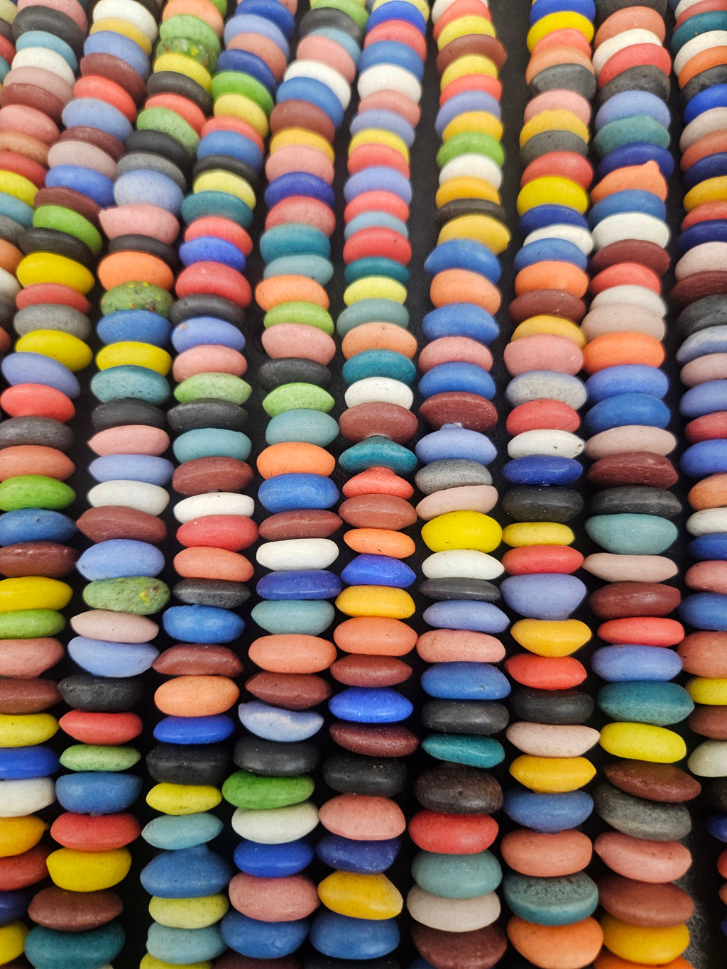 Multicolored African saucer beads