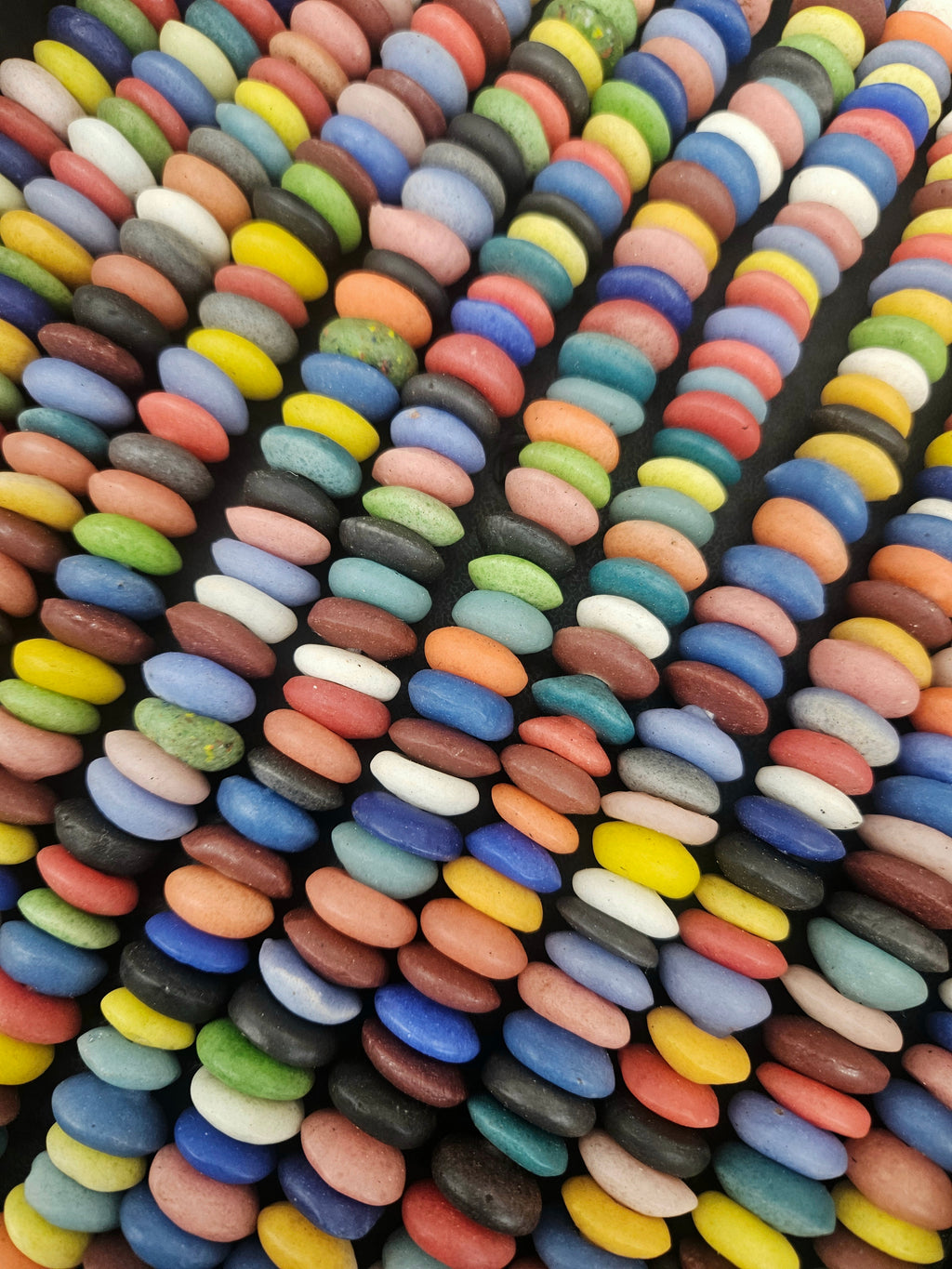 Multicolored African saucer beads