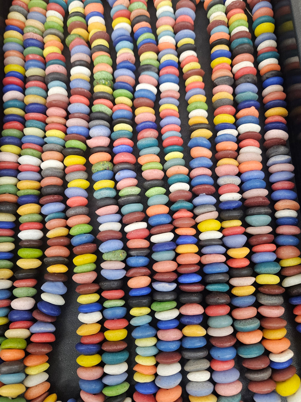 Multicolored African saucer beads