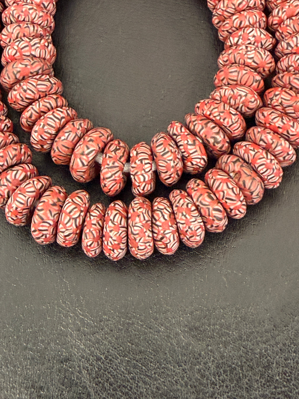 Handcrafted Coral & Black African Saucer Glass Beads from Ghana | Sustainable African Glass Beads