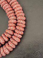 Handcrafted Coral & Black African Saucer Glass Beads from Ghana | Sustainable African Glass Beads