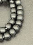 AADAMPO Curator Bundle™ | Coral Hand-Painted Krobo Rondelle Glass Beads & Matte Black Pocket Glass Beads | Handmade in Ghana