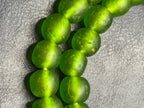African Glass Bead Bundle – Multicolor Painted Rondelles with Lime Green Pocket Glass Beads