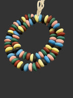 Handcrafted Heritage Designer Mix Ashanti glass rondelle beads from Ghana featuring blue, green, blush, ivory, charcoal, and terracotta tones.