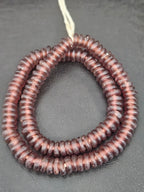 Authentic handmade dusty plum Krobo translucent recycled glass rondelle beads from Ghana with a matte frosted finish arranged as a full strand for jewelry making, designer collections, and wholesale sourcing.

26. PRO-TIPS