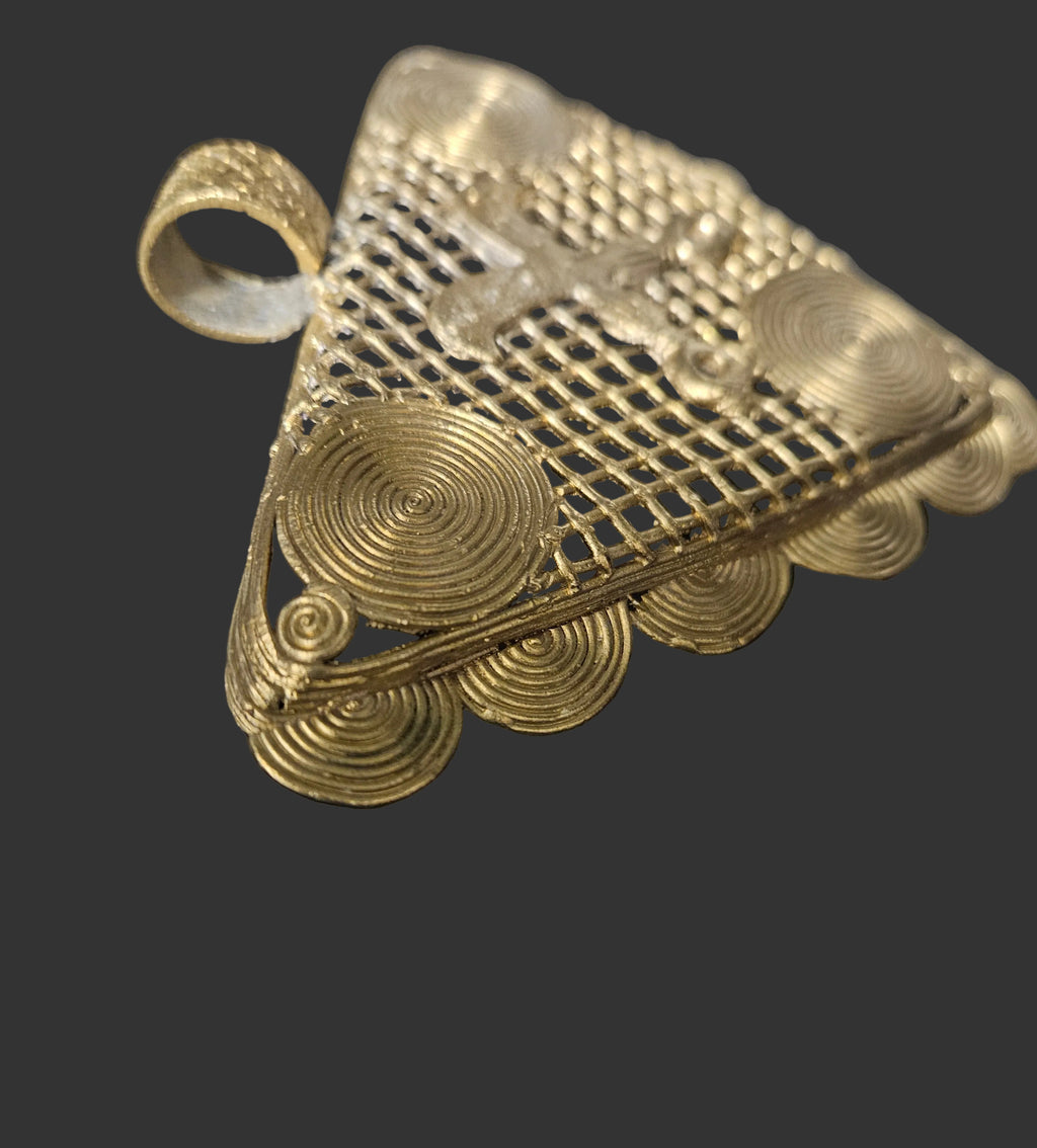 Large textured bail on handcrafted Akofena brass pendant from Ghana.