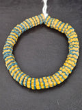 Handcrafted golden yellow and teal blue Krobo glass spacer beads from Ghana featuring recycled glass artisan craftsmanship and striped spacer-bead design.