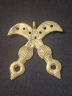 Oversized handcrafted Akofena Adinkra symbol pendant made from traditional Ashanti brass in Ghana representing courage, leadership, responsibility, authority, and cultural heritage.