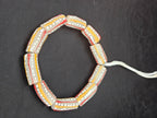 Krobo Painted Glass Tube Beads – Soft Ivory Gray with Golden Yellow & Coral Red Stripes
