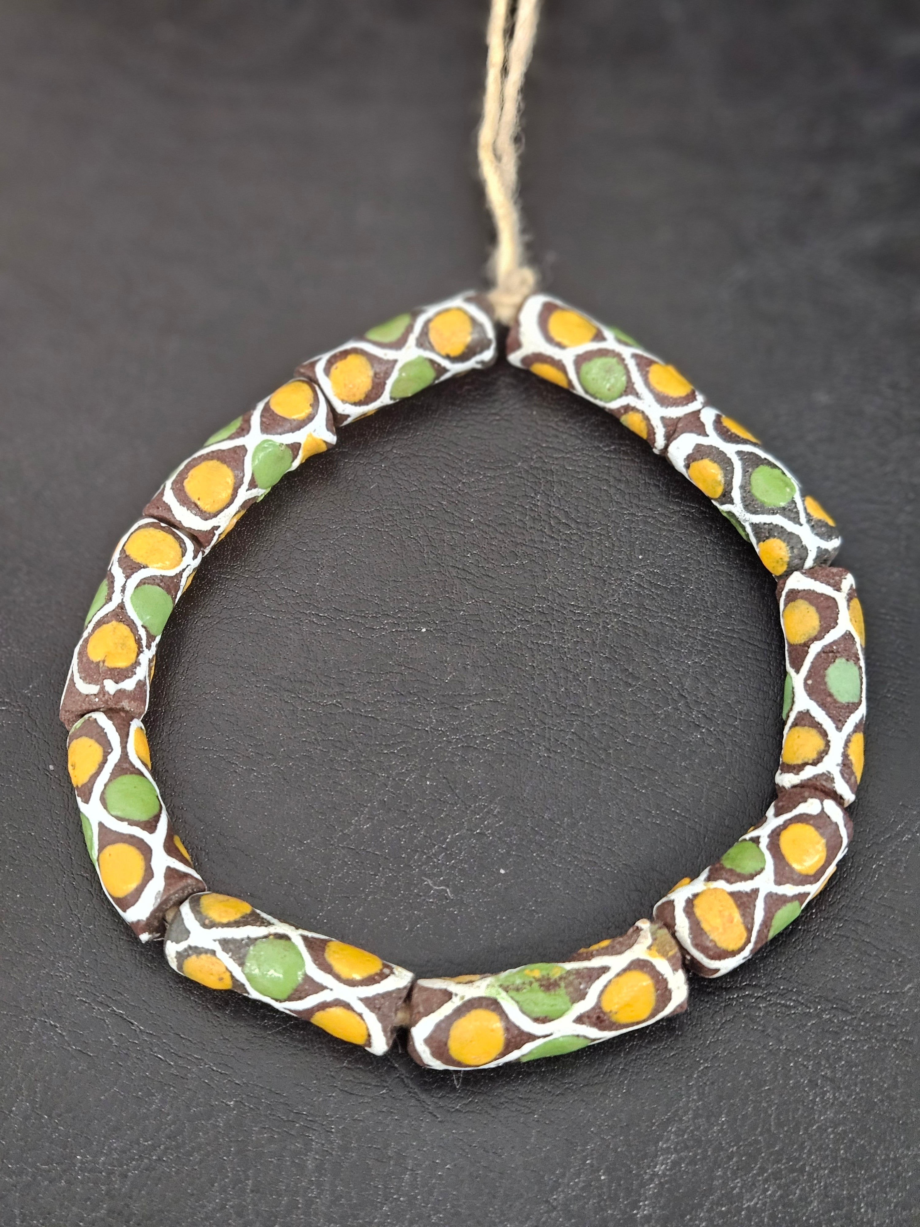 Chocolate Brown Krobo Painted Glass Tube Beads with Golden Yellow & Leaf Green Mosaic Motifs | Handcrafted Recycled Glass from Ghana