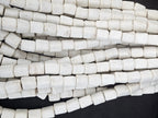 Classic Ivory Cube Tube Krobo Powdered Glass Beads | Handmade Recycled Glass Beads from Ghana | 30–32 Beads