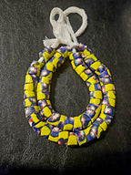 Designer Patterned Trade Beads – Yellow, Blue & Red Motif Strand