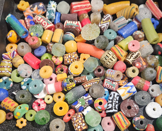 Close-up showing vibrant hand-painted Krobo beads from Ghana.