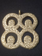 Oversized handcrafted Mati Masie Adinkra symbol pendant made from traditional Ashanti brass in Ghana representing wisdom, understanding, discernment, knowledge, and thoughtful leadership.