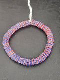Handcrafted royal blue and coral Krobo glass spacer beads from Ghana featuring recycled glass artisan craftsmanship and striped spacer-bead design.