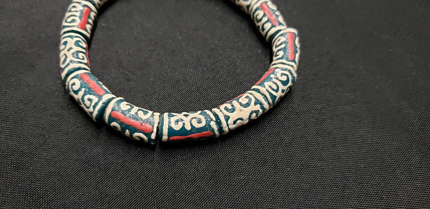 African Recycled Glass Beads Symbolizing Humility and Strength: Crafting with Meaning. - Aadampo