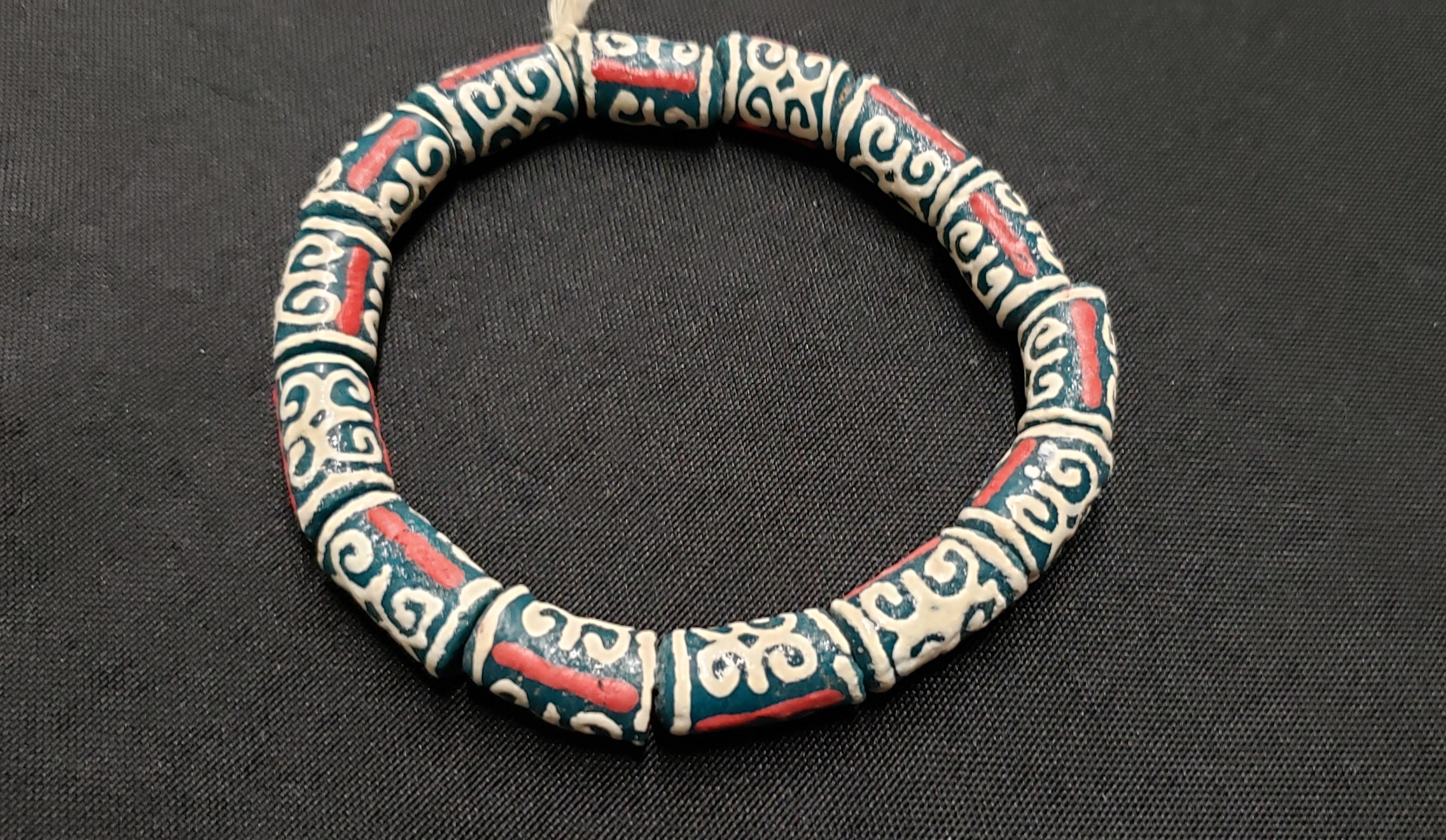 African Recycled Glass Beads Symbolizing Humility and Strength: Crafting with Meaning. - Aadampo