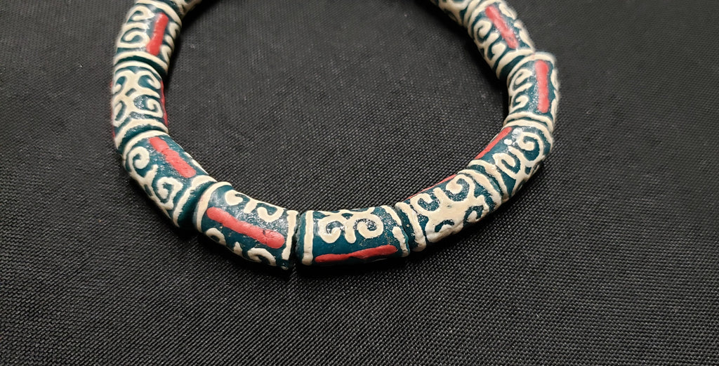 African Recycled Glass Beads Symbolizing Humility and Strength: Crafting with Meaning. - Aadampo