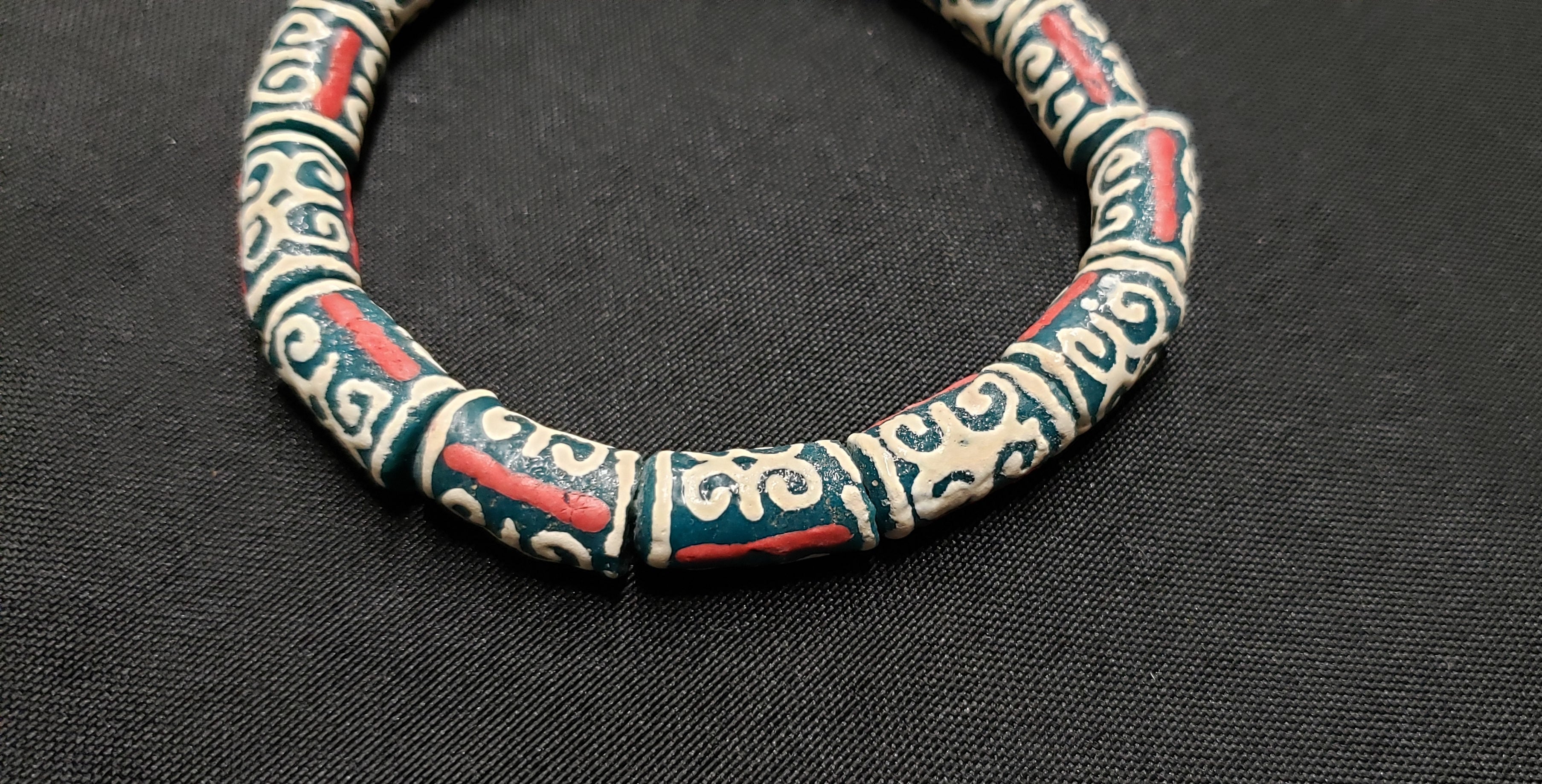 African Recycled Glass Beads Symbolizing Humility and Strength: Crafting with Meaning. - Aadampo