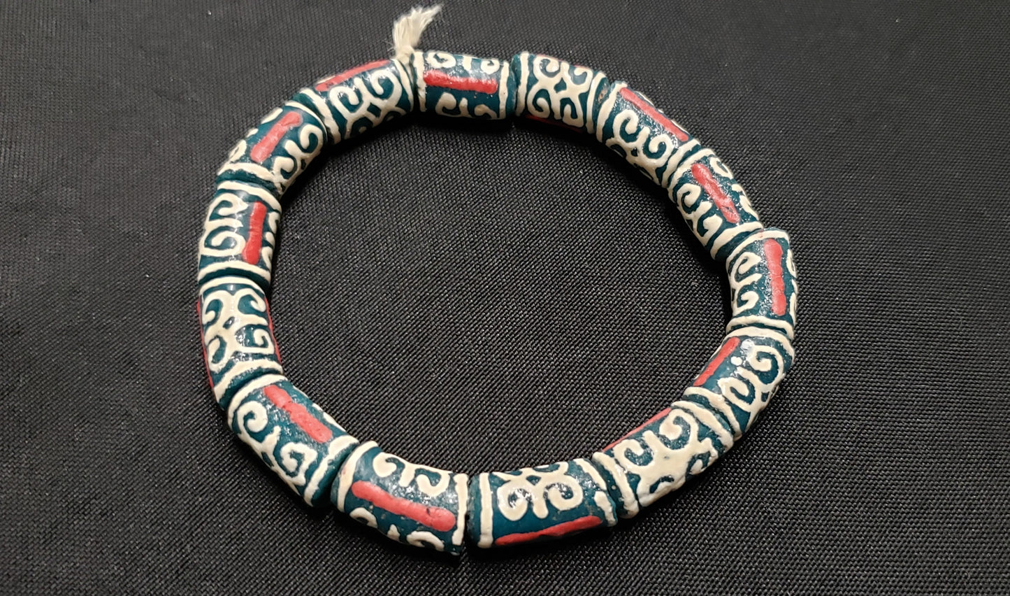 African Recycled Glass Beads Symbolizing Humility and Strength: Crafting with Meaning. - Aadampo