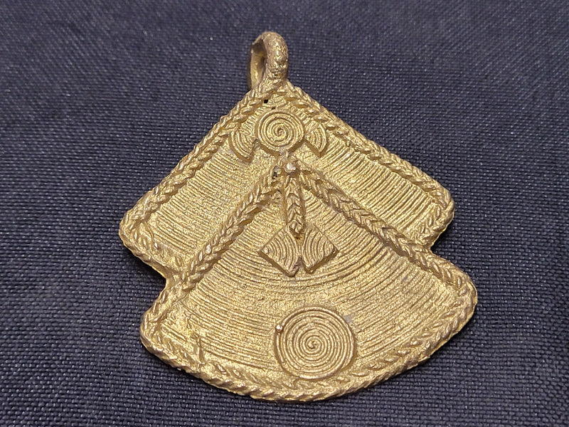 African brass pendant with double fan design
